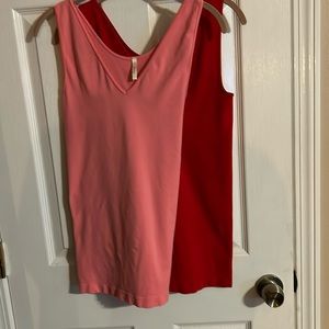 Pink &Red reversible tanks Sz L very stretchy each one has a pull on them $12
